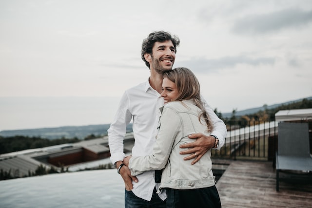 woman hugging man