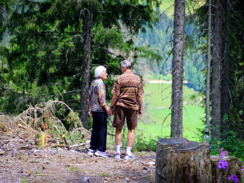 elderly Standing in Forest