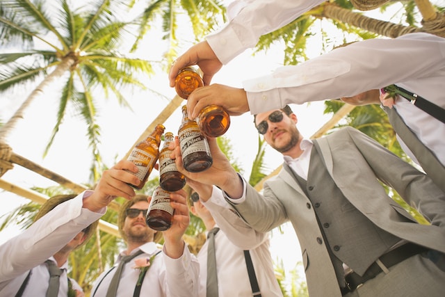 groomsmen holding beer
