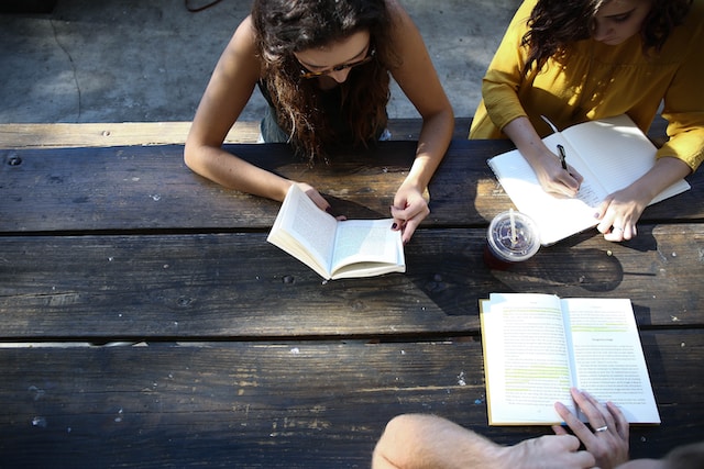 students studying on bench